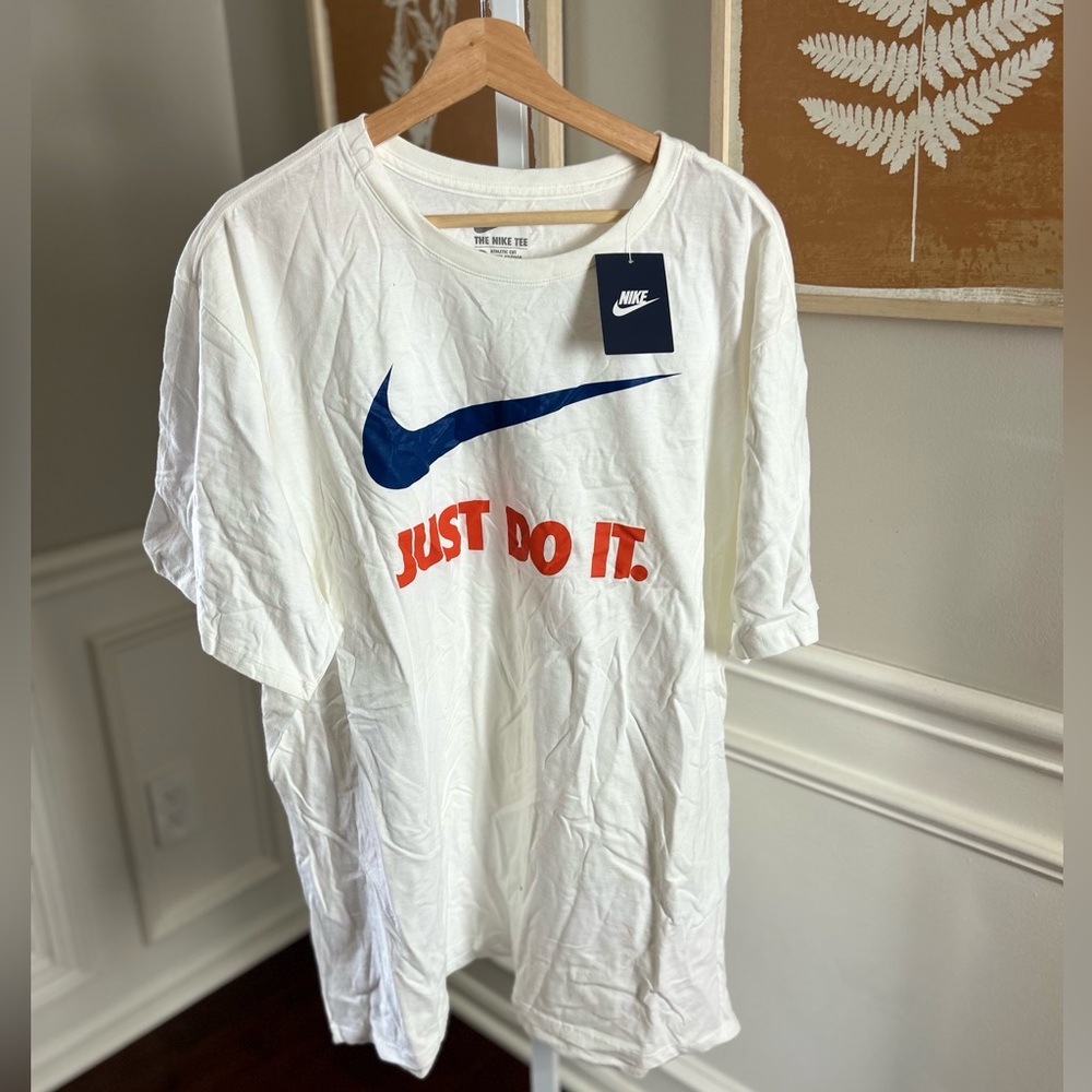 Nike White Short Sleeve Tee with Blue Swoosh and Orange 'Just Do It.'